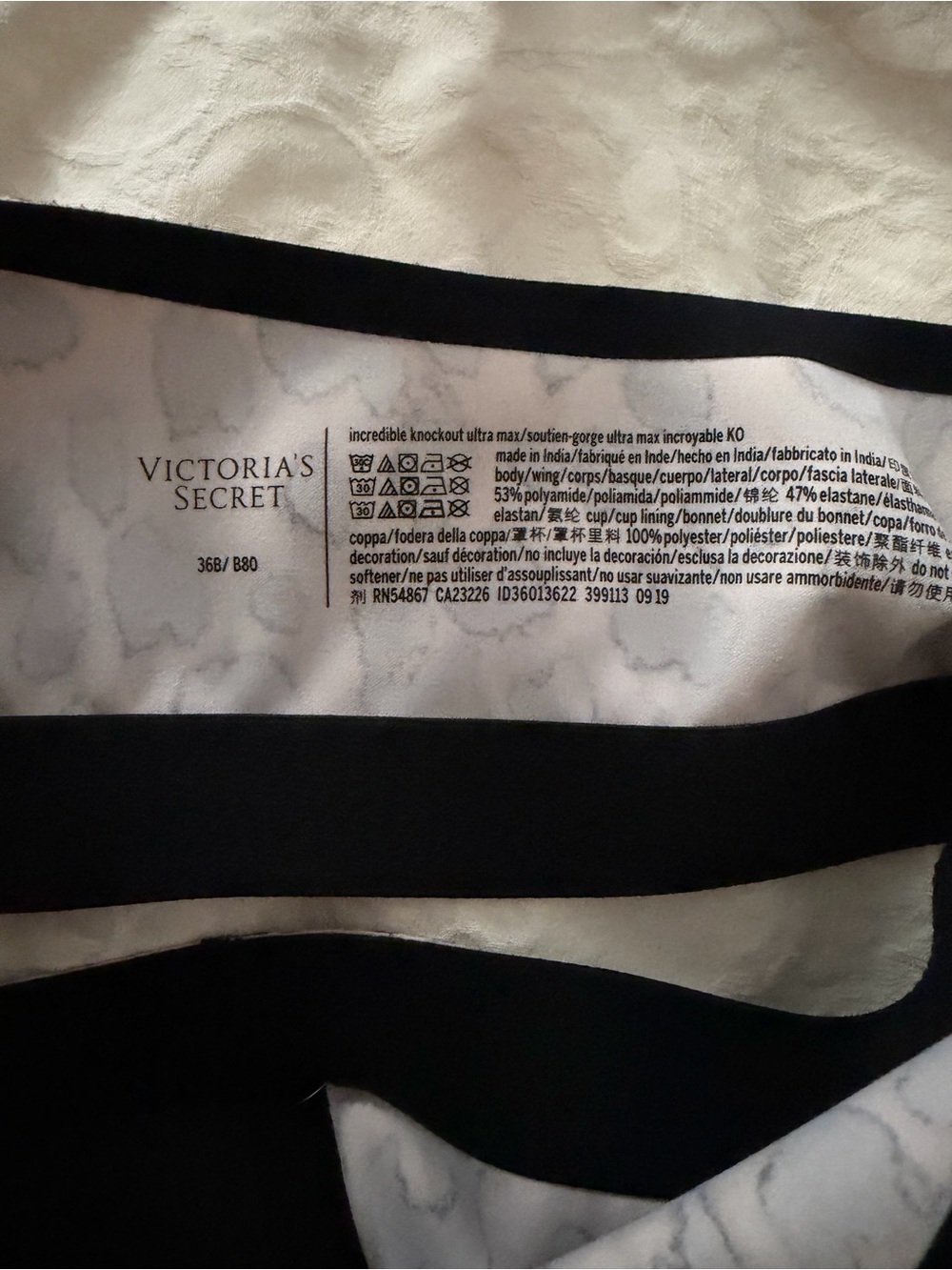 Victoria's Secret Leopard-Print Front-Zip Sports Bra - Beige & Black - Picture 8 of 8